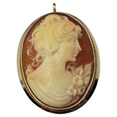 Vintage 14 Karat Yellow Gold Cameo Brooch/Pendant- This elegant cameo brooch features a lovely lady in profile set in classic 14K yellow gold. Can be worn as a brooch or a pendant. Size: 28 mm x 22 mm Weight: 2.6 dwt. / 4.1 gr. Stamped: Italy 14K Very good condition, professionally polished. Will come packaged in a gift box or pouch (when possible) and will be shipped U.S. Priority Mail Insured. DV112822/17KCS Classic Oval Brooches, Oval Brooches For Formal Occasions, Profile Set, Cameo Brooch, Estate Jewelry, Priority Mail, Vintage Jewelry, Gift Box, Yellow Gold