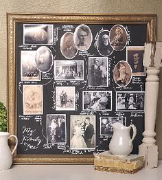 a white vase sitting on top of a table next to a black and white photo