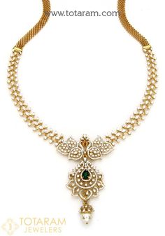 18 Karat Gold 'Peacock / 3 in 1' White & Yellow Gold Polish Diamond Necklace with Color Stones & South Sea Pearls This Product has a Detachable Pendant whic 235-DN526 - in 35.600 Grams for USD $6.00. Made in India by Totaram Jewelers this product is in 18 Karat Gold & is an exellent gift for Adult - Women. Ships fully insured & secured guaranteed delivery for free with your order over $250 from New Jersey USA with 30 days exchange policy. Elegant 22k Gold Bridal Necklace, Elegant 22k Gold White Bridal Necklace, White Peacock Design Jewelry For Celebration, Elegant White 22k Gold Bridal Necklace, Festive White Jewelry With Peacock Design, Festive White Peacock Design Jewelry, Yellow Gold Jewelry With Peacock Design For Anniversary, Elegant Round Necklace With Peacock Design, Formal Yellow Gold Jewelry With Peacock Design