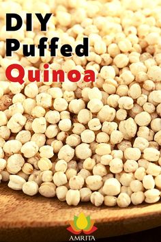 white quinoa on a wooden plate with the words diy puffed quinoa