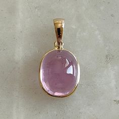 This stunning Pendant is set in 14k Solid Yellow Gold with Natural Kunzite with utmost precision. It is a unique gemstone Pendant for nearly every occasion and is completely hassle-free jewelry. ITEM DETAILS: * GEM: Kunzite * GEM SIZE: 9X11mm * GEM SHAPE: Oval * Gem weight: 7.51 carats * Gold Purity: 14KT (58.33% approx.) * Gold Weight: 0.52 gram * Total Weight of the Pendant: 2.02 gram The Gold purity is guaranteed and it comes with authentic 14KT gold hallmark. Since my items are handmade, the Prong Setting Pendant, Kunzite Jewelry, Oval Jewelry, Pink Kunzite, Handmade Jewelry Box, Bezel Pendant, Jewelry Lookbook, September Birthstone, October Birthstone