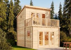 a small wooden house in the middle of some trees