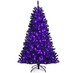 a purple christmas tree with lights on it