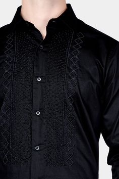 Experience the epitome of luxury with our Jade Black Moti Work Hand Stitched Designer Shirt. Crafted from Super Soft Premium Cotton, it's a masterpiece of meticulous craftsmanship, adorned with stunning moti work. This shirt redefines fashion, combining opulence with elegance. Elevate your style with this exquisite and timeless classic! Fused collar and cuffs, collar stand and flat felled side seams provide structure and stability to all our shirts. 100 % Premium Cotton; Comfortable soft hand, g Shirts For Men Designer Shirts For Men Designer Formal, Fancy Shirt For Men, Luxury Black Kurta With Stand Collar, Fitted Black Embroidered Sherwani, Black Embroidered Sherwani Straight Kurta, Black Semi-stitched Elegant Sherwani, Black Embroidered Semi-stitched Sherwani, Moti Work, Shirts For Men Designer