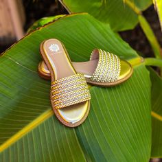 Get ready for compliments with these LASKY slide sandals! The one-band slide features supple faux leather braids with inset rhinestones for instant glam. The wrapped insole, crafted with our Signature Yellow Box High Rebound EVA, makes them perfect for all-day wear. Toe: almond Heel Height: 1 inch Platform Height: 0.75 inches Materials: leather Insole: Yellow Box High Rebound EVA Outsole: rubber Yellow Box Shoes, Mule Sneakers, Sandals Wedges, Most Comfortable Shoes, Tick Tock, Heels & Wedges, Flats For Sale, Sandals For Sale, Flat Boots