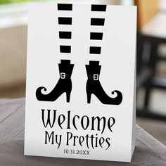 a welcome card with the words welcome my pretties in black and white on it