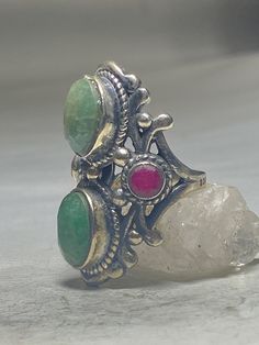 "Emerald Ring Ruby long sterling silver women Low grade stones Size 6.50 Weight 14.8g Length 1 1/2\" Width. 1/2\" Thinnest part of band. 1/8\" Free Shipping & Free Postal Insurance Delivered in a Gift Box If you do not want the ring polished and want to leave the natural patina please let me know at the time of purchase as I do polish rings before I ship rings out. Thanks Free First Class shipping and postal insurance is included. If you want to upgrade to priority kindly pay an additional f Anniversary Rings With Natural Stones, Oval Silver Emerald Ring With Multi-stone, Spiritual Multi-stone Sterling Silver Rings, Oval Emerald Ring In Silver With Multi-stone, Silver Oval Emerald Ring With Multi-stone, Spiritual Sterling Silver Multi-stone Rings, Spiritual Sterling Silver Emerald Ring, Spiritual Multi-stone Silver Rings, Silver Multi-stone Spiritual Rings