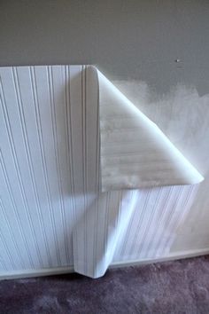 the corner of a room that has been painted white