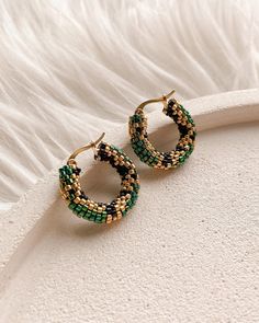 💖 Jazz up your Halloween outfit with these snake print earrings!  These unique beaded hoop earrings are the perfect accessory to elevate your spooky look. These gold, black and emerald green seed bead hoop earrings are not just for Halloween - they make a fabulous Christmas gift for mom or any jewelry lover in your life These handmade earrings are comfortable to wear all day long * MATERIALS * Hoops are made of high quality Japanese seed beads. Because of it's shape there is no space between ea Green Beaded Hoop Earrings For Gift, Trendy Handmade Hoop Beaded Earrings, Trendy Hoop Beaded Earrings As Gift, Trendy Hoop Earrings With Tiny Beads For Gift, Green Small Hoop Earrings With Tiny Beads, Small Green Hoop Earrings With Colorful Beads, Green Small Hoop Beaded Earrings With Tiny Beads, Handmade Green Hoop Earrings For Party, Green Jewelry With Black Round Beads