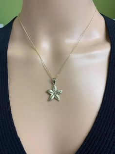 "14k solid gold starfish pendant on 18\" solid gold chain. pendant measures 1\" by 3/4\". perfect match to the earrings we have in our shop. ** includes 14k solid gold 18\" chain **" 14k Yellow Gold Starfish Jewelry, 14k Gold Starfish Charm Jewelry For Gifts, 14k Gold Jewelry With Starfish Charm For Gift, Gold Starfish Charm Jewelry, Gold Starfish Charm Jewelry In 14k Gold, Gold Jewelry With Starfish Charm In 14k Gold, 14k Gold Starfish-shaped Jewelry, 14k Gold Jewelry With Starfish Charm, Gold Chain Pendant