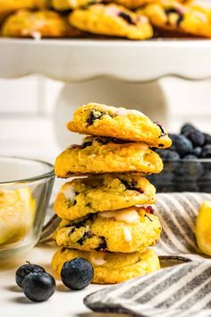 lemon blueberry muffins stacked on top of each other