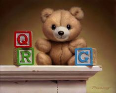 a brown teddy bear sitting on top of blocks with the letters q and g spelled out