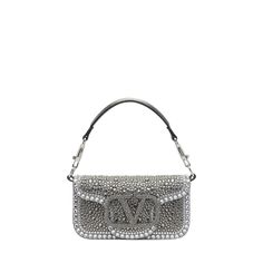 Valentino Garavani "Loco" shoulder bag in allover rhinestone-embellished leather  Detachable top handle  Detachable chain shoulder strap Can be worn as a top handle or shoulder bag  Flap top with VLOGO magnetic closure  Interior, one slip pocket  Approx. 4.3"H x 7.9"W x 2"D Made in Italy Glamorous Bags With Silver-tone Hardware And Top Handle, Glamorous Top Handle Bag With Silver-tone Hardware, Evening Shoulder Bag With Rhinestones Crossbody, Luxury Leather Shoulder Bag For Events, Evening Rhinestone Crossbody Shoulder Bag, Glamorous Leather Evening Shoulder Bag, Glamorous Evening Leather Shoulder Bag, Luxury Top Handle Shoulder Bag For Events, Luxury Evening Bags With Rhinestones