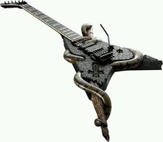 a metal sculpture of an electric guitar