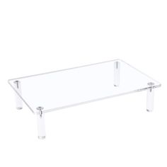 a glass coffee table with metal legs