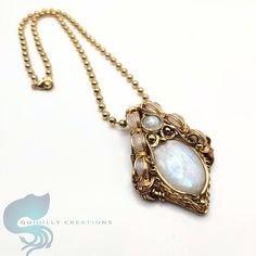 Celestial Wire Wrapped Moonstone Jewelry, Moonstone Necklace With Large Pendant, Moonstone Jewelry With Pearl Pendant, Moonstone Pearl Pendant Jewelry, Artisan Gold Moonstone Necklaces, Artisan Gold Moonstone Necklace, Oval Moonstone Necklace Wire Wrapped, Oval Moonstone Wire Wrapped Necklaces, Celestial Moonstone Wire Wrapped Necklaces