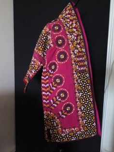 "Turkmen Silk Embroidered Chirpy Costume. All fine silk and cotton embroidery. Great workmanship. It has arms and wearable but this is a costume goes on to the head at weddings and pretty heavy costume. There are some small worn areas at the upper parts of arms. Size: Arm to Arm 61.4\" - 156 cm, Height 42.1\" - 107 cm and Skirt 26.7\" - 68cm and Armpit 23.7\" - 60 cm. Free Express Shipping." Traditional Fitted Cotton Kaftan, Fitted Cotton Traditional Kaftan, Traditional Pink Kimono For Festive Season, Bohemian Silk Traditional Wear With Long Sleeves, Festive Pink Traditional Kimono, Festival Traditional Wear With Long Sleeves And Traditional Patterns, Bohemian Embroidered Cotton Fabric In Traditional Drape, Fitted Bohemian Purple Dupatta, Festive Traditional Fitted Kimono