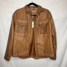 Max Studio Cognac Leather Long Sleeve Button Down Size: S Condition: New With Tags (Nwt) Color: Cognac How It Fits Collared Oversized Rounded Square Bottom Composition Faux Leather Button Down Button Sleeve Cuff Casual Leather Outerwear With Buttoned Pockets, Casual Leather Outerwear With Snap Closure, Casual Outerwear With Snap Closure For Work, Casual Leather Outerwear With Buttons, Olive Green Shirt, Paisley Shorts, Cap Sleeves Blouse, Rounded Square, Womens Khakis