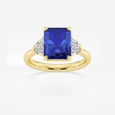 10x8mm Radiant Cut Created Sapphire and 5/8 ctw Lab Grown Diamond Three-Stone Engagement Ring 14K Yellow Gold Luxury Three Stone Sapphire Ring With Baguette Cut, Luxury Sapphire Ring With Three Stone Baguette Cut, Luxury Three-stone Sapphire Ring With Baguette Cut, Radiant Cut Sapphire Ring With Accent Stones, Classic Yellow Gold Sapphire Ring With Radiant Cut, Yellow Gold Radiant Cut Sapphire Ring With Center Stone, Classic Cubic Zirconia Radiant Cut Sapphire Ring, Luxury Three Stone Emerald Cut Sapphire Ring, Luxury Three-stone Emerald-cut Sapphire Ring