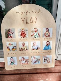 a wooden sign with pictures of babies on it that says, my first year is here