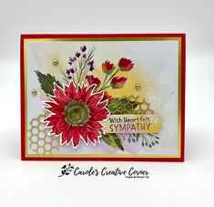 a close up of a card with flowers and words on the front, which reads wish heart felt sympathy