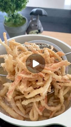 a bowl filled with food on top of a table