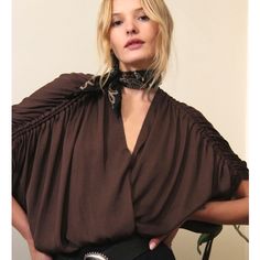 From Free People: Rachel's Silky Top Is All About Sexy Spring Style. The Deep V Neckline Is Round-Shaped At The Front And Gently Sloping At The Back, Leading To A Tie Sleeve Detail That Drapes Sexily Over The Upper Arms. This Boho Top Has A Relaxed Fit, So Be Sure To Wear With Your Favorite High-Waisted Short Or Skirt. Never Worn, Only Cut The Tags Off! White Crochet Blouse, Free People Kimono, White Peasant Blouse, Black Floral Blouse, Boho Tunic Tops, Silky Top, Ruffle Bell Sleeve, Balloon Sleeve Blouse, Silky Blouse