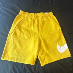 Men’s Small Yellow Nike Shorts Nwt Sweatpants Material Standard For At Knee Length Nike Cotton Bottoms With Comfort Waistband, Nike Bottoms With Elastic Waistband For Leisure, Nike Leisure Bottoms With Elastic Waistband, Nike Cotton Bottoms With Elastic Waistband, Nike Bottoms With Elastic Waistband And Short Leg, Casual Yellow Shorts For Leisure, Casual Sports Pants With Short Legs, Nike Bottoms With Built-in Shorts For Leisure, Sporty Yellow Cotton Bottoms