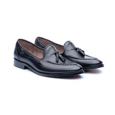 Men's black tassel loafers. Made of the best Ecuadorian cowhide, 100% natural. Hand finished. Cushioned leather insole and full leather lining. Leather outsole. Ethically made in Ecuador.SIZESWe usually have most sizes in stock. In case yours is out of stock, we will manufacture it. Please measure the length of your feet (from the heel to the tip of the longest toe) and width. Then compare your measurement with the sizes below:US = EU = FEET'S LENGTH * WIDTH5 US = 37 EU = 24cm*8.5cm6 US = 38 EU Elegant Wingtip Tassel Loafers With Leather Lining, Elegant Tassel Loafers With Leather Lining For Business Casual, Leather Closed Toe Tassel Loafers For Business, Leather Tassel Loafers For Business With Closed Toe, Elegant Slip-on Tassel Loafers With Leather Lining, Elegant Closed Toe Moccasins With Goodyear Welt, Elegant Goodyear Welted Closed Toe Moccasins, Elegant Closed-toe Moccasins With Goodyear Welting, Elegant Tassel Loafers With Leather Lining For Work