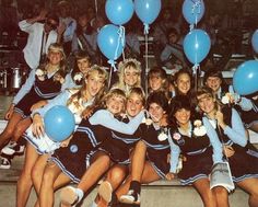 the cheerleaders are posing for a group photo