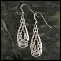 Sterling Silver Celtic teardrop open knotwork earrings. Sterling Silver Teardrop Jewelry With Artistic Design, Artistic Sterling Silver Teardrop Earrings, Artistic Sterling Silver Teardrop Jewelry, Artistic Teardrop Sterling Silver Jewelry, Silver Teardrop Earrings With Artistic Design, Artistic Silver Teardrop Jewelry, Artistic Teardrop Silver Jewelry, Handmade Sterling Silver Teardrop Earrings For Formal Occasions, Unique Teardrop Earrings