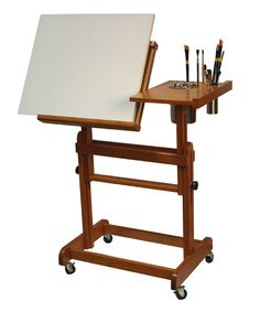 a wooden easel with a white board on it