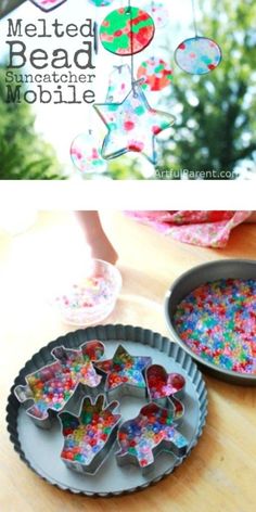 two tin pans filled with colorful sprinkles on top of a wooden table