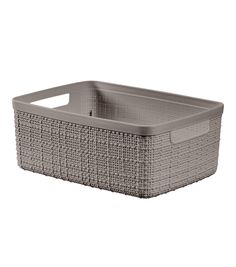 an empty white basket with handles