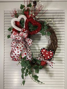 a wreath with two hearts on it