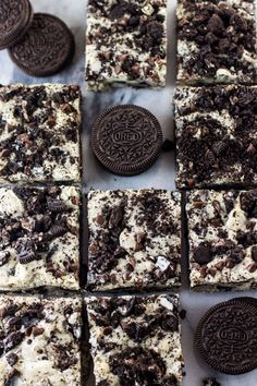 oreo cookies and cream squares are arranged on a table