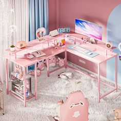 a pink desk with an apple computer on it in a room filled with toys and decor