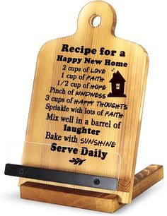 a cutting board with a recipe for a happy new home