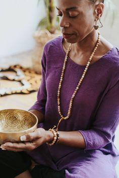 Harness the warmth and powerful energy of the sun with this golden Yellow Jade 108 bead mala necklace handcrafted in Kathmandu. This mala emits a sunny yellow energy and helps to rejuvenate the Solar Plexus Chakra that enables you to feel joyful, warm and energetic. Whether you wear it around your neck or wrap it around your wrist, Yellow Jade is believed to bring good fortune, happiness, and self-confidence to those who carry it. Yellow Jade is is a motivational stone that encourages expression Bohemian Mala With 108 Beads For Blessing, Bohemian 108 Beads Mala For Blessing, Yellow Spiritual Beaded Necklace With Gemstone Beads, Spiritual Mala With 108 Beads For Blessing, Holistic Hand-strung Mala For Meditation, Yellow Hand-strung Jewelry For Meditation, Spiritual Hand-strung Amber Beaded Necklaces, Hand-strung Spiritual Mala For Meditation, Gold Healing Mala With 108 Beads