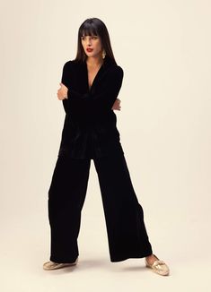 Introducing a sophisticated solid black jacket & pants co-ord set, meticulously crafted in luxurious silk velvet. This ensemble exudes timeless elegance and versatility, perfect for any occasion. Elevate your wardrobe with this chic combination, designed to make a statement with effortless style. Elegant Winter Loungewear Sets, Luxury Evening Pantsuit For Fall, Chic Black Velvet Outerwear, Velvet Tuxedo Style Evening Outerwear, Elegant Straight Velvet Pants, Elegant Fall Loungewear Sets, Elegant Velvet Blazer For Night Out, Elegant Velvet Formal Pants, Black Velvet Pants For Party