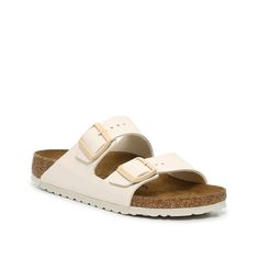 Birkenstock-Arizona Sandal - Women's Enjoy comfort and support with the Arizona sandals from Birkenstock. An elevated version of a classic, this pair features a casual slide silhouette but is crafted by a molded footbed that conforms to the individual shape of your foot. White Double Strap Sandals With Cork-bed Midsoles, Classic White Footbed Sandals With Cork-bed Midsoles, Comfortable White Slides With Leather Footbed, Classic White Footbed Sandals For Spring, Comfortable White Slides With Cork-bed Midsoles, Classic White Slides With Round Toe, Classic Flat Adjustable Sandals, Classic Spring Footbed Sandals, Classic White Sandals With Cork-bed Midsoles