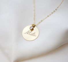 Personalized large circle disk tag necklace in Gold filled or Sterling silver. Have this custom necklace personalized with your child's name, your name, initials or any meaningful word of your choice. This necklace is perfect for a special meaningful keepsake gift for mom, friend wife or that special someone. OPTIONS Material: SS// for Sterling silver GF// for Gold filled Disk size : 16mm // 19mm Cubic Zirconia charm: You can choose from the drop down bar menu to add a 4mm CZ charm PLEASE READ B Coin Choker, Disk Necklace, Gold Disc Necklace, Mom Friend, Disc Necklace, Circle Necklace, Letter Necklace, Coin Necklace, Coin Pendant