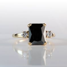 Don't miss this opportunity to own this beautiful gemstone ring! => Gemstone Type - Onyx, Clear Quartz => Gemstone Cut - Faceted => Gemstone Size - 8*10 mm, 3 mm => Total Number of Gemstones - 3 => Metal Type - 14k Gold Filled (Tarnish Resistant and Nickel Free) - also available in 925 sterling silver and 14k solid gold * Please contact me for pricing on sizes larger than 11 * ~ Feel free to ask me about custom made designs. ❏ Replacements and custom orders: ✪ 925 sterling silver - no additional Engagement Ring Rectangle, Gemstone Gold Ring, Ring Black Stone, Ring Rectangle, Gold Ring Engagement, Rectangle Ring, Black Stone Ring, Gold Gemstone Ring, Black Onyx Ring