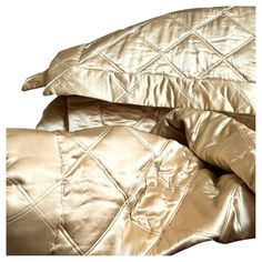 the comforter is shiny and gold in color