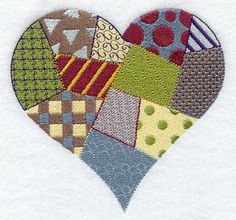 a patchwork heart with many different designs on it