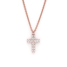 The larger version of our Small Asscher Cross Pendant. Giving off the illusion of a glass surface, 11 natural diamonds are set in a 4-prong arrangement. A testament to the bond between faith and luxury, each pendant comes ready-to-wear with a matching adjustable 18" solid gold chain. Carat | 1.14 ctw (+/- .01cts)Clarity | VSColor | DEFCut | AsscherGold | 14 karat Note: In-stock products ship same-day or next-day depending on the time of your order. For made-to-order items please allow up to 1-3 Fine Jewelry Rose Gold Cross Pendant, Rose Gold Cross Pendant Fine Jewelry, Rose Gold Cubic Zirconia Cross Pendant, Elegant Rose Gold Cross Jewelry, Elegant Cross Shaped Jewelry With Single Cut Diamonds, Timeless Diamond Cross Pendant Jewelry, Elegant Cross Jewelry With Single Cut Diamonds, Elegant Single Cut Diamond Cross Pendant Jewelry, Rose Gold Cross Pendant For Formal Occasions