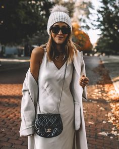 The Satin Slip Dress You Need Now - and ways you can style it! - Karina Style Diaries Satin Slip Dress Outfit, Street Style Winter Casual, Street Style Aesthetic Outfit, Fashion Inspo Outfits Minimal Chic, Slip Dress Outfit, White Beanie