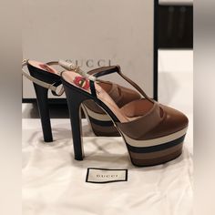 Gucci Stacked Leather Platform. All Original Packaging. Size 39 Fit True To Size. Super Comfortable. Colors Brown, Navy, Cream Accents. Elegant Multicolor Leather Heels, Designer Gucci Brown Heels, Luxury Brown Gucci Heels, Chic Brown Gucci Heels, Gucci Designer Calf Leather Heels, Brown Gucci Heels For Party, Shoes Gucci, Colors Brown, Gucci Shoes