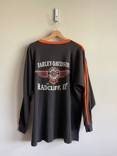 1998 long sleeve crewneck Harley Davidson Crewneck shirt   authentic Harley Davidson In great condition size xlarge  Love the orange is so vibrant!  Great vintage style and shape Retro Long Sleeve Sports T-shirt, Black Long Sleeve T-shirt 90s Style, Biker Long Sleeve T-shirt For Motorcycling, Biker Long Sleeve Streetwear T-shirt, Biker Long Sleeve T-shirt For Streetwear, Biker Style Long Sleeve Streetwear T-shirt, Biker Style Long Sleeve T-shirt For Streetwear, Orange Long Sleeve T-shirt With Graphic Print, Orange Long Sleeve Graphic T-shirt