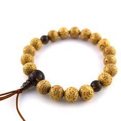 10mm Bodhi Seed Wood & Brown Quartz Bracelet Adjustable Round Bracelets For Puja, Adjustable Bracelets For Puja, Traditional Adjustable Bracelet With Wooden Beads, Traditional Adjustable Bracelet With 8mm Beads, Traditional Bracelets With 8mm Beads For Festivals, Adjustable Round Bracelets For Festivals, Adjustable Bracelets For Festivals, Traditional Adjustable Stretch Bracelet With Round Beads, Traditional Stretch Bracelet With Adjustable Round Beads